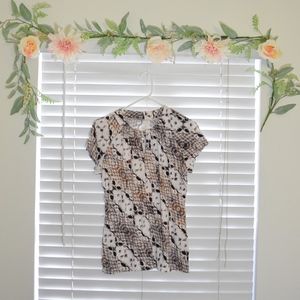 Worthintong –  Animal Print Short Sleeve Blouse